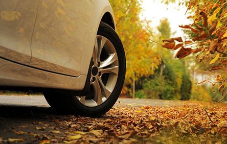 large semi-truck with the front end laying on its side